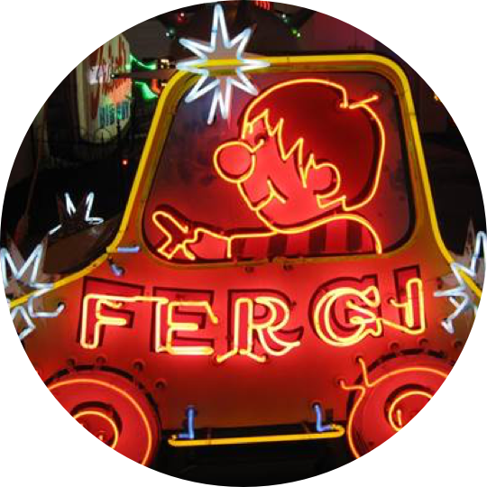 A neon sign of a car with the name " fergi ".